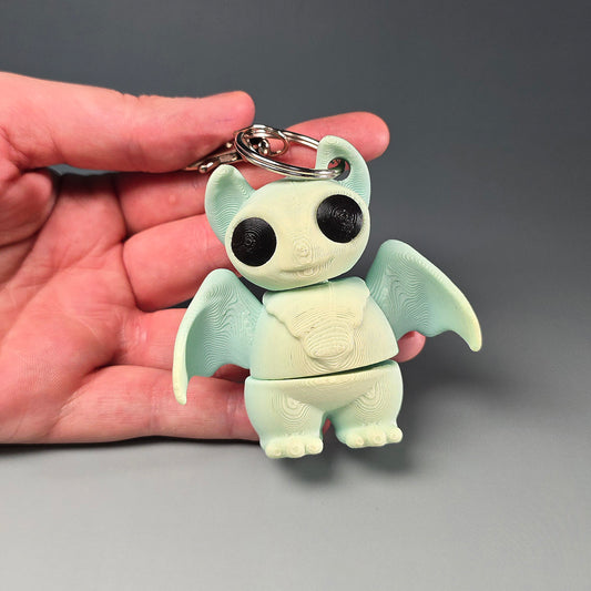 Sikspārnis atslēgu piekariņš