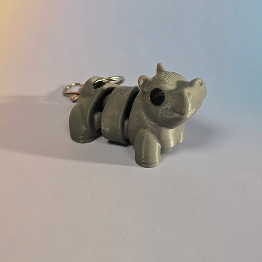 Nīlzirga atslēgu piekariņš