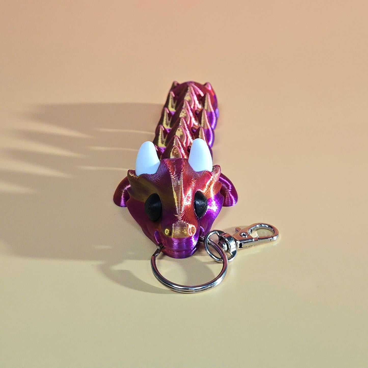 Pūķa atslēgu piekariņš