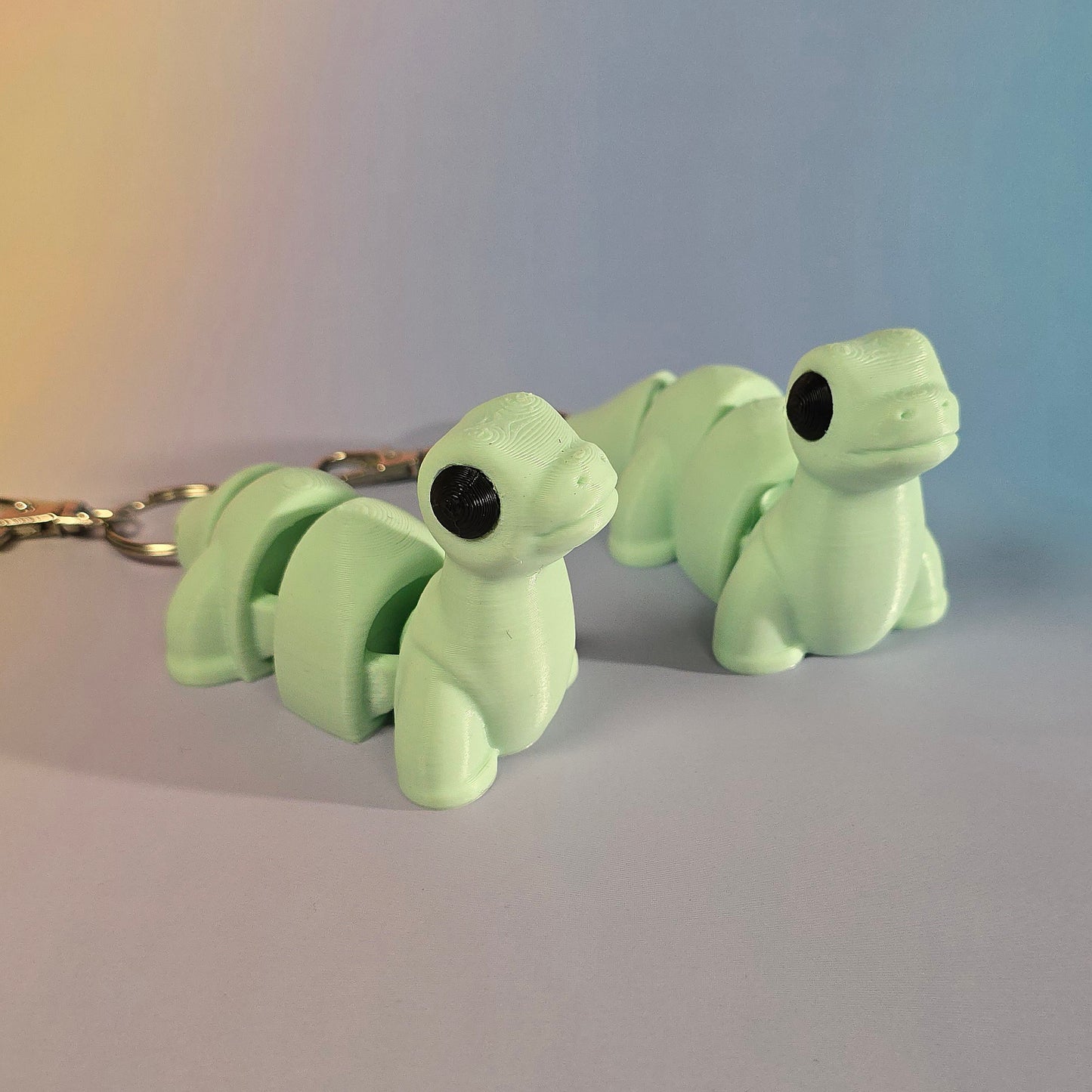 Dinozaura atslēgu piekariņš