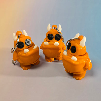 Briesmonīša atslēgu piekariņš