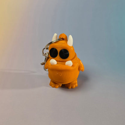 Briesmonīša atslēgu piekariņš