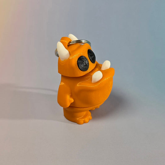 Briesmonīša atslēgu piekariņš