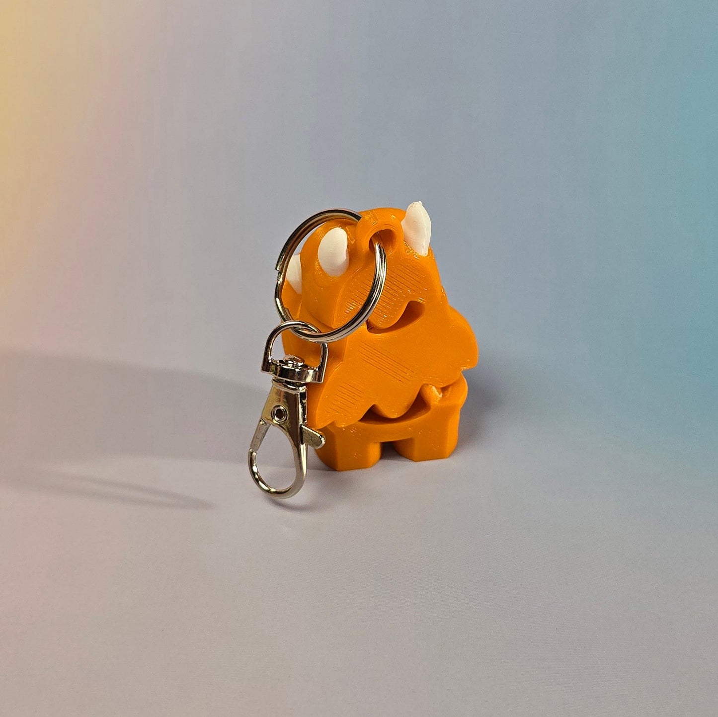 Briesmonīša atslēgu piekariņš