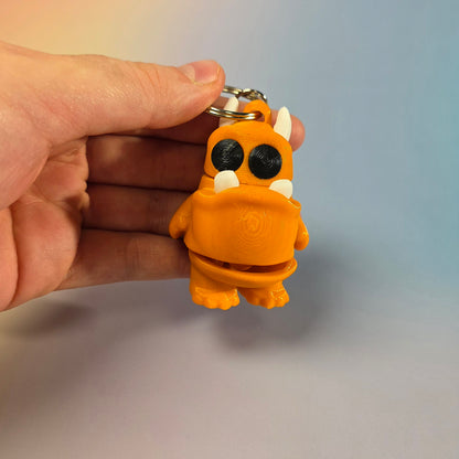 Briesmonīša atslēgu piekariņš