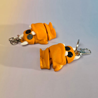 Briesmonīša atslēgu piekariņš