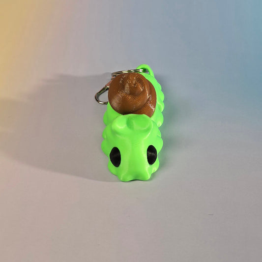 Gliemeža (Spānis) atslēgu piekariņš